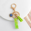 Green Glitter Letter Keychain with Evil Eye Charm and Suede Tassel view 11