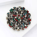 Openwork Round Floral Crystal Brooch in Antique Gold Tone view 3