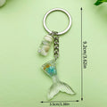 Starfish, Shell and Mermaid Charm Keychains Featuring Flower Across 29 Pictured Variations view 2