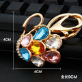 Mixed Moonstone Swan and Peacock Keychains in Six Pictured Designs view 8