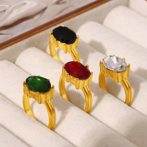 Display view of oval faceted glass statement rings in main image 2.