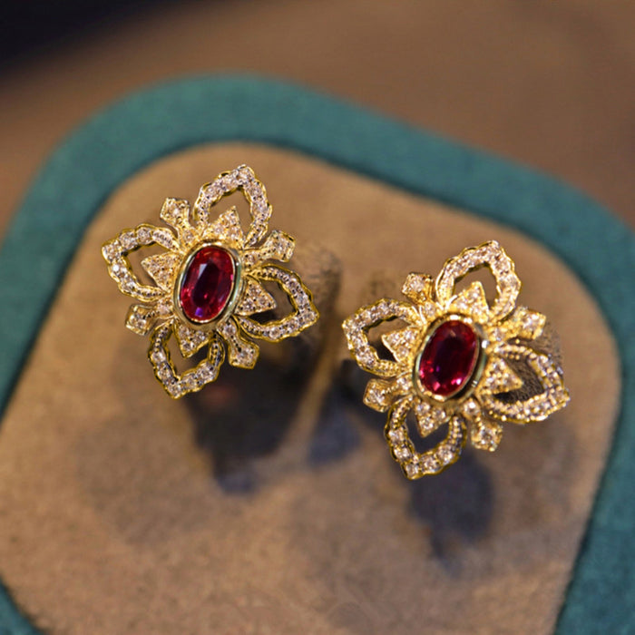 Gold Tone Open Flower Red Center Clear Pavé Stud Earrings