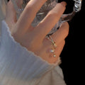 Gold Tone Double Layer Open Ring With Pearl Like Chain Dangles view 3