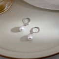 Gold and Silver White Pearl Look Drop Huggie Earrings view 2