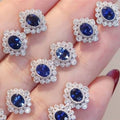 Silver Oval Floral Halo Stud Earrings Clear Blue Pair view 2