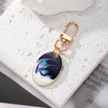 Gold Tone Oval Marbled Swirl Enamel Clip Keychains in Six Colors view 7