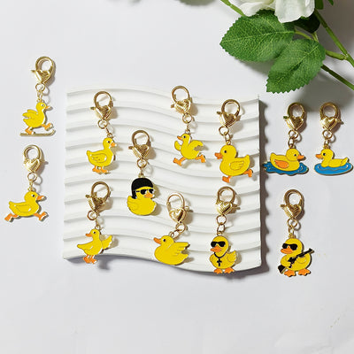 Main product view of gold Tone Yellow Duck Heart-Clasp Charms in Twelve Playful Designs