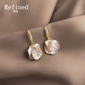 Gold Tone Clear Stone Hook And Iridescent Flower Drop Earrings view 1