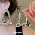 Open Triangle Metal Stud Earrings in Polished Statement Design view 3