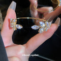 Gold Tone Leaf Crystal Open Bangle In Clear Pink Or Purple view 3