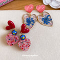 Resin Heart Drop Earrings in Pink Blue and Red Colorways view 1