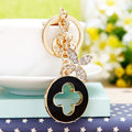 Jeweled Clover Medallion Keychains with Black and White Faux Fur Poms view 4