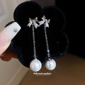 Crystal Bow Chain Earrings With Pearl Drops in Three Colors view 3
