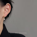 Gold Tone Leaf Top And Oval White Pearl Drop Stud Earrings view 2