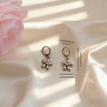 Silver Daisy Flower Huggie Hoop Earrings Gold Center view 4