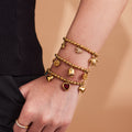 Bell Flower Marine and Heart Charm Bracelet Collection in Three Finishes view 1