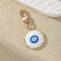 Gold Tone White Heart and Round Evil Eye Clip Keychains view 5