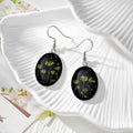 Black Oval Pressed Flower Drop Earrings in Nine Botanical Designs view 10