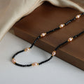 Black Faceted Bead Necklace With Pink Pearls Gold Accents view 3