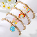 Gold Tone Beaded Smiley Butterfly Unicorn and Rainbow Bracelets view 2