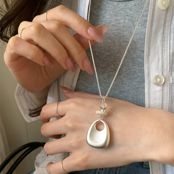 Silver Tone Sculptural Handbag Pendant Necklace with Decorative Accents