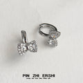 Pavé CZ Bow Huggie Hoop Earrings Gold and Silver Tones view 7