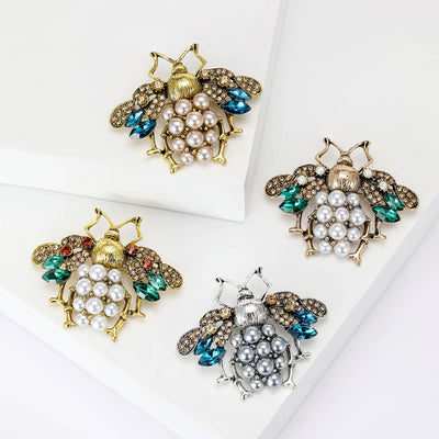 Pearl Bee brooch front view on a white background