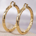 Gold Tone Large Faceted Hammered Texture Hoop Earrings view 3