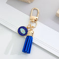 Gold-Tone Rhinestone Evil Eye Keychain with Blue Suede Tassel view 11