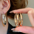Double Teardrop Hoop Earrings in Gold and Silver Tone view 2
