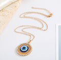 Large Round Crystal Halo Blue Evil Eye Pendant Necklaces in Two Finishes view 5