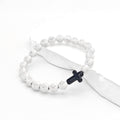White Cross Bead Stretch Bracelet Black Cross Accent view 1