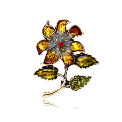 Front product view of an enamel flower brooch