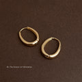 Gold Polished Oval Hinged Hoop Earrings Thick Front view 3