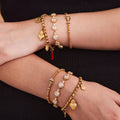Crystal Station Charm and Fish Skeleton Bracelets in Two Finishes view 2