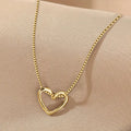Interlocking Open Heart Pendant Necklace in Gold Tone Finish view 1