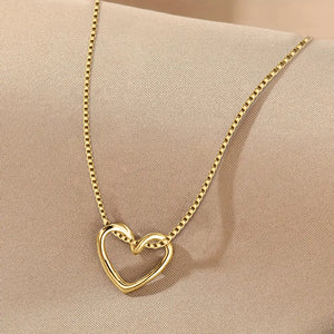 Interlocking Open Heart Pendant Necklace in Gold Tone Finish