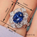 Silver Tone Blue Oval Flower Halo Cocktail Finger Ring view 4