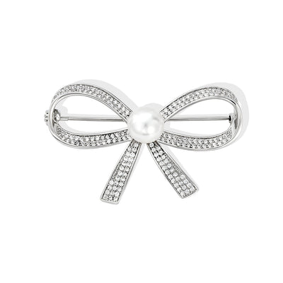 Front view of the silver bow metal brooch