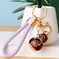 Jeweled Peanut and Auspicious Charm Keychains with Braided Wrist Loops view 12
