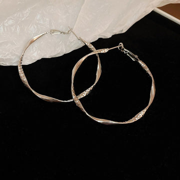 Round Hoop Earrings in Assorted Textures and Sizes