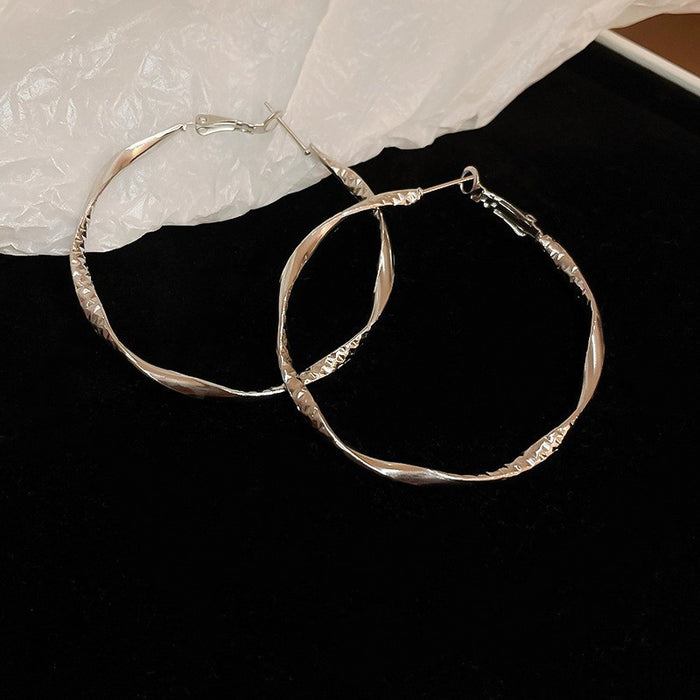 Round Hoop Earrings in Assorted Textures and Sizes