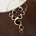 Gold Oval Cabochon Swirl Tassel Necklace And Earrings Set view 7