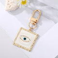 Gold Tone Square Heart and Round Evil Eye Clip Keychains view 7