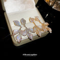 Crystal Leaf Branch Drop Earrings in Gold and Silver Tones view 3