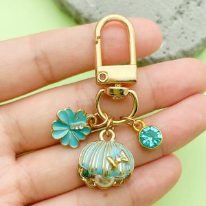 Ocean Theme Charm Keychain with Enamel Flower, Faux Pearl Shell, and Crystal