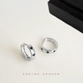 Silver Huggie Hoop Earrings Black Heart Enamel Accents view 1
