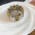 Mixed Metal Stretch Bracelets With Embossed Oval Links view 4
