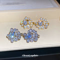 Crystal Flower Clip-On Earrings in Silver and Gold view 2