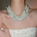 Multi Strand White Pearl Style Knotted Statement Necklace view 1
